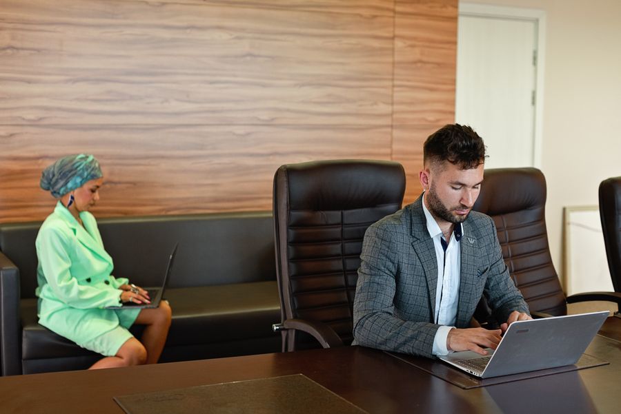 professionals using laptops